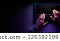 Male hands are typing on a laptop keyboard. 126392199