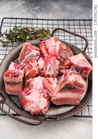 Raw Beef meat and veal bones for stew or goulash. grey background. top view 126392242