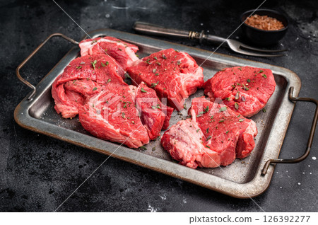 Raw beef boneless shank shin meat with herbs and spices ready for cooking. isolated on white background. top view 126392277