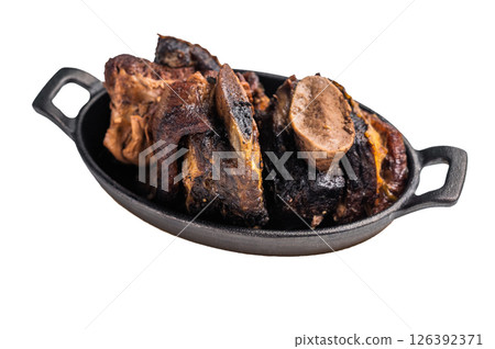 Beef short ribs slow-cooked to perfection, served on a stylish plate with vibrant sides, showcasing a delicious and hearty meal isolated on white background. top view Beef short ribs slow-cooked to perfection, served on a stylish plate with vibrant sides, showcasing a delicious and hearty meal isolated on white background. top view 126392371