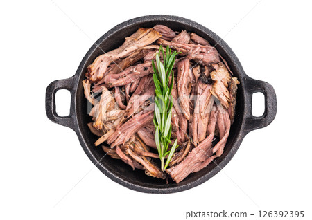 Savory pulled beef brisket served in a skillet, dipping creating an appealing and mouthwatering culinary scene isolated on white background. top view Savory pulled beef brisket served in a skillet, dipping creating an appealing and mouthwatering culinary scene isolated on white background. top view 126392395