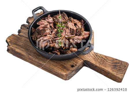 Slow cooked Shredded beef ragu in a skillet isolated on a white background. top view 126392410
