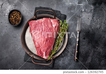 Raw Wild Boar meat, fresh Game Meat. black background. top view 126392745