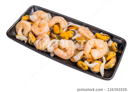 Seafood Cocktail appetiser with Mussels, Clams, Prawns, Shrimps and squid isolated on white background. top view Seafood Cocktail appetiser with Mussels, Clams, Prawns, Shrimps and squid isolated on white background. top view 126392830
