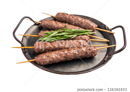 Grilled Cevapcici ready for the grill, roast Cevapi from mince beef meat isolated on white background. top view 126392833