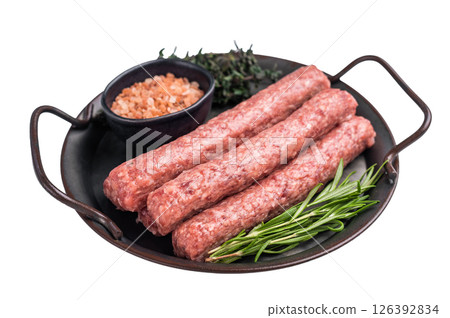 Raw Cevapcici ready for the grill, fresh Cevapi from mince beef meat isolated on white background. top view 126392834