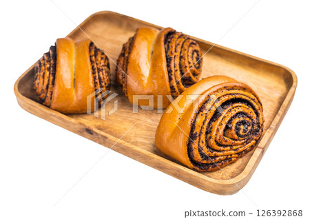 Baked Poppy Seed Rolls isolated on white background. top view Baked Poppy Seed Rolls isolated on white background. top view 126392868
