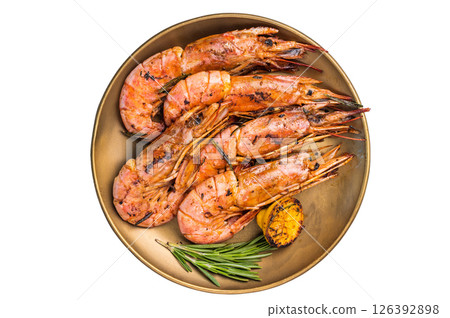 Grilled red Argentine shrimps, Prawns Langostino Austral on a plate with herbs isolated on white background. top view Grilled red Argentine shrimps, Prawns Langostino Austral on a plate with herbs isolated on white background. top view 126392898