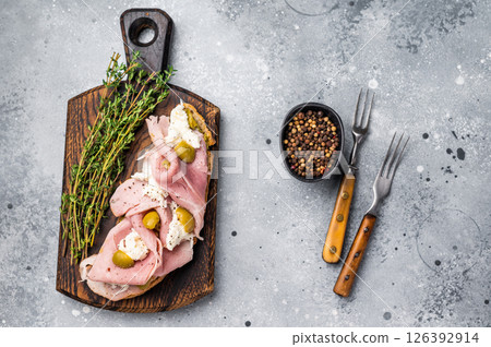 Open Sandwich with Prosciutto Cotto, mozzarella and olives. grey background. top view 126392914