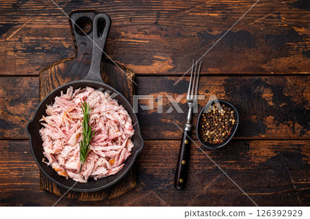 BBQ smoked Pulled Chicken meat in a skillet. wooden background. top view 126392929