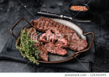 Grilled Beef Machete Skirt Steak, prime meat. black background. top view 126392945