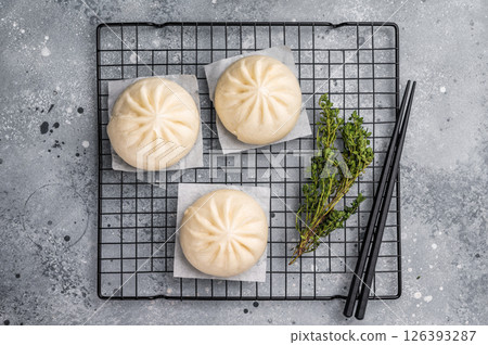 Baozi Bun, Chinese Steamed bun with meat. grey background. top view 126393287