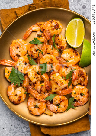 BBQ dinner with roast Shrimps Prawns in a plate. Gray background. Top view 126393371