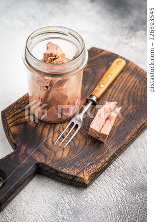 Versatile tinned canned tuna ready to elevate your recipes, from pasta dishes to hearty casseroles. white background. top view Versatile tinned canned tuna ready to elevate your recipes, from pasta dishes to hearty casseroles. white background. top view 126393545