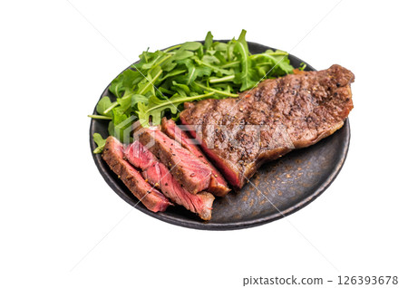 BBQ Grilled Striploin steak on a plate with salad, strip steak, prime roast beef meat isolated on white background 126393678