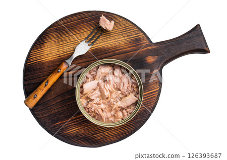 Freshly opened tinned tuna, showcasing its rich texture and flavor, a must-have for any pantry. isolated on white background. top view Freshly opened tinned tuna, showcasing its rich texture and flavor, a must-have for any pantry. isolated on white background. top view 126393687