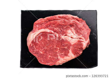 Fresh Raw Rib eye steak, dry aged prime beef meat isolated on white background Fresh Raw Rib eye steak, dry aged prime beef meat isolated on white background 126393721