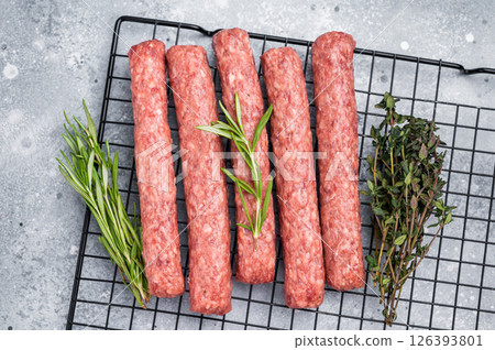 Raw beef and lamb meat kebabs sausages, kofta kebab. grey background. top view 126393801