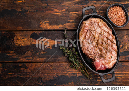 Roast pork tender loin steak, neck meat. wooden background. top view 126393811