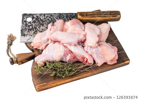Fresh chicken wings, showcasing their natural texture, perfect for creating savory snacks or hearty meals. isolated on white background. top view Fresh chicken wings, showcasing their natural texture, perfect for creating savory snacks or hearty meals. isolated on white background. top view 126393874