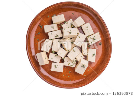 Uncooked Diced soybean tofu cheese on plate isolated on white background. top view 126393878