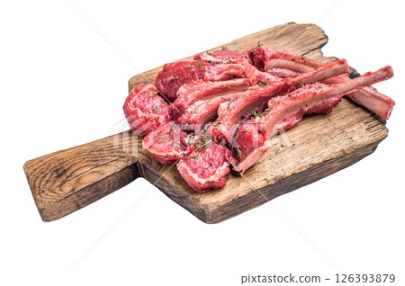 Raw mutton cutlets, fresh lamb meat chops on a wooden board isolated on white background. top view 126393879