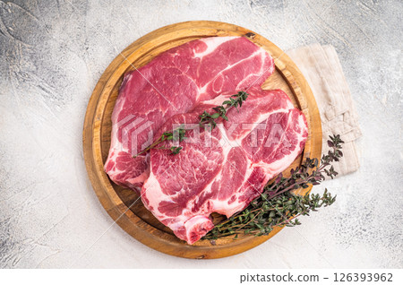 Raw pork tender neck steak, fresh meat. grey background. top view 126393962