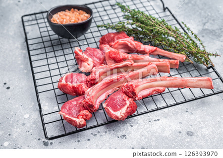 Raw lamb meat chops, fresh mutton cutlets. grey background. top view 126393970
