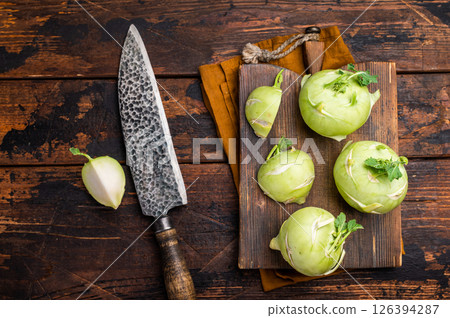 Cabbage kohlrabi on wooden board, raw Organic Vegetable. wooden backround. top view 126394287