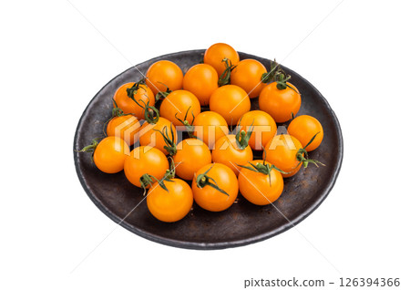 Uncooked small tomatoes. red, green and yellow cherry tomatoes assortment, cocktail mix isolated on white background. top view Uncooked small tomatoes. red, green and yellow cherry tomatoes assortment, cocktail mix isolated on white background. top view 126394366