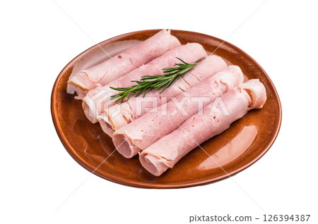 Italian Sliced Prosciutto Cotto ham on plate isolated on white background. top view 126394387