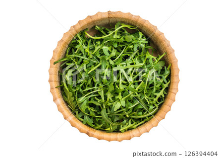 Fresh arugula leaves, vibrant and peppery, perfect for adding a zesty touch to salads and sandwiches. isolated on white background. top view Fresh arugula leaves, vibrant and peppery, perfect for adding a zesty touch to salads and sandwiches. isolated on white background. top view 126394404