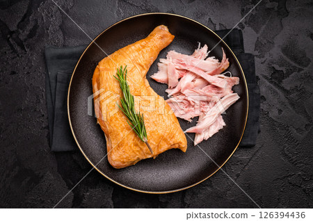 Traditional Smoked chicken leg, poultry meat on plate. black background. top view 126394436