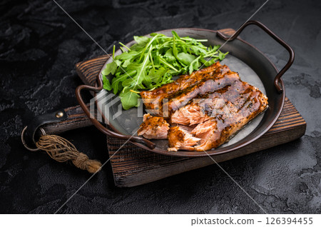 Roasted Teriyaki salmon fillet with salad. black background. top view 126394455