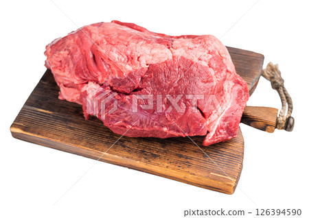 Fresh raw boneless beef shank displayed on a wooden cutting board, showcasing its rich color and marbling, perfect for hearty soups and stews. isolated on white background. top view 126394590