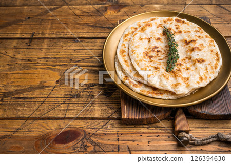 Potato Stuffed Flat Bread Aloo paratha, Traditional Indian food. wooden background. top view 126394630