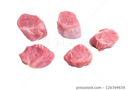 Uncooked pork loin medallion, cut tenderloin ready to be seasoned and cooked into a delicious gourmet dish. isolated on white background. top view 126394639