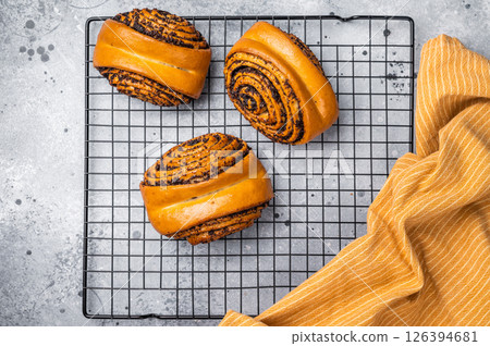 Baked Poppy Seed Rolls. grey background. top view 126394681