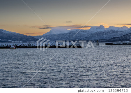 Mountains with snow in sunrise, Hamnvik, Norway Mountains with snow in sunrise, Hamnvik, Norway 126394713