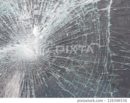 Broken car windshield, detail shot Broken car windshield, detail shot 126396538