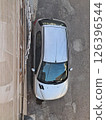 Parked car at front of building- top viewpoint 126396544