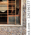 abandoned building with broken window - close up shot 126396577