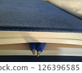 Two ballpen inside notebook pages 126396585