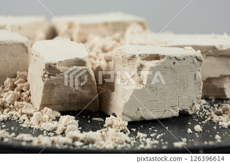Macro texture of compressed fresh yeast cubes 126396614