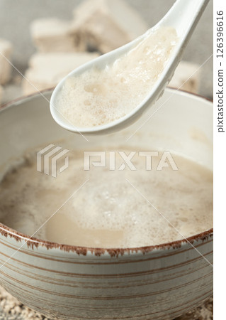 Activation of wet fresh yeast in warm water with sugar. Activation of wet fresh yeast in warm water with sugar. 126396616