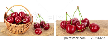 red sweet cherry in a wicker basket on wooden table isolated on white background with full depth of field red sweet cherry in a wicker basket on wooden table isolated on white background with full depth of field 126396654