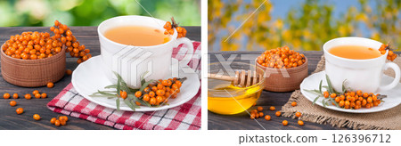 Tea of sea-buckthorn berries on wooden table with blurred garden background 126396712
