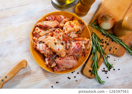 Chicken wings pickled for grilling 126397561