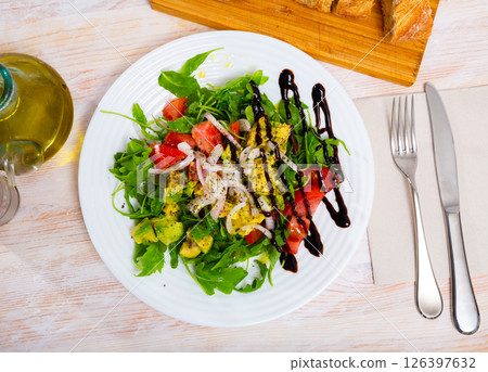Salad with fresh tomatoes, avocado 126397632