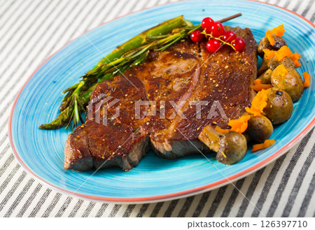 Roasted veal steak with baked vegetables Roasted veal steak with baked vegetables 126397710